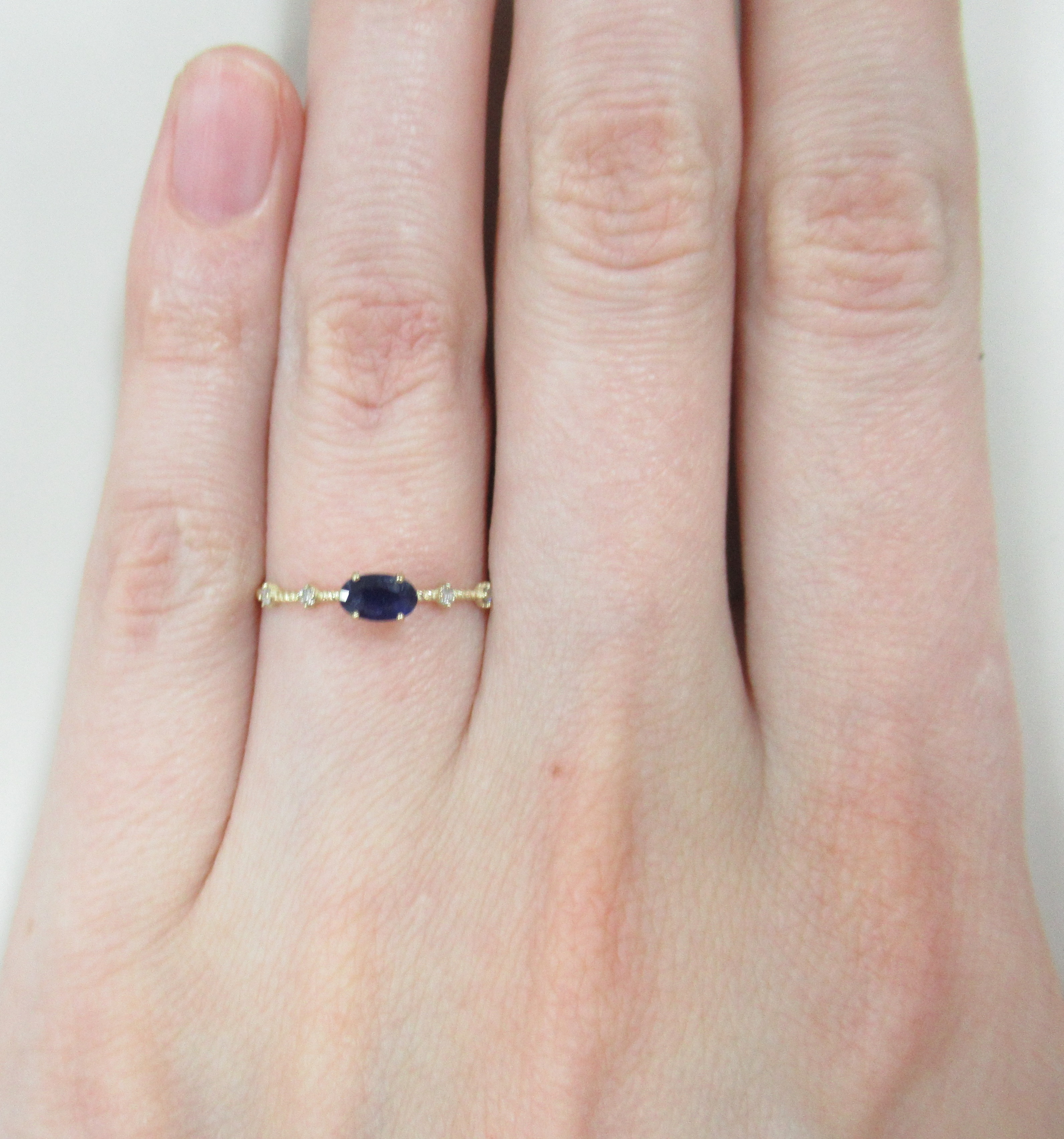 Кольцо из желтого золота с сапфиром